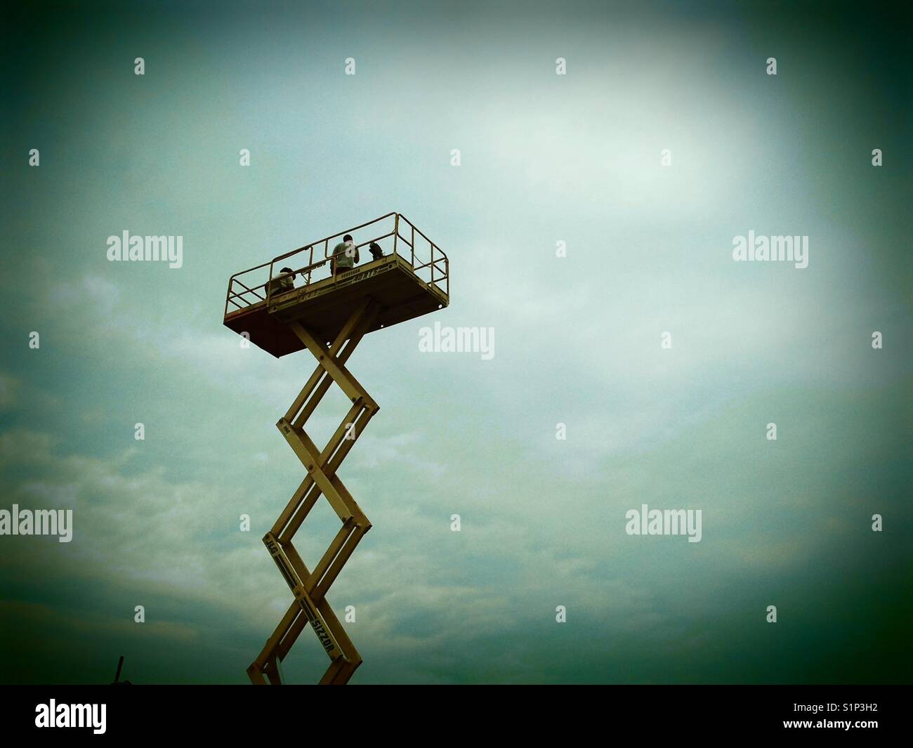 Men in lift - Smartphone Captured Stock Image