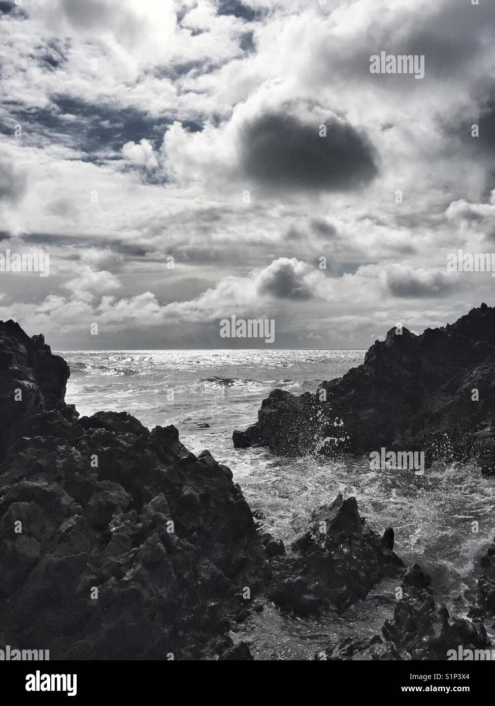Tide coming in through rocks on anglesey coast - Smartphone Captured Stock Image