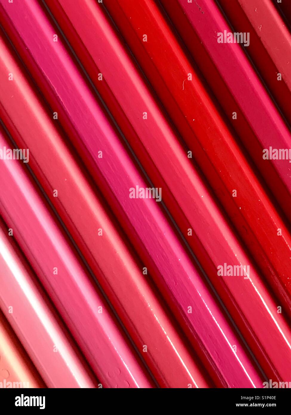 Red and pink color pencils. - Smartphone Captured Stock Image