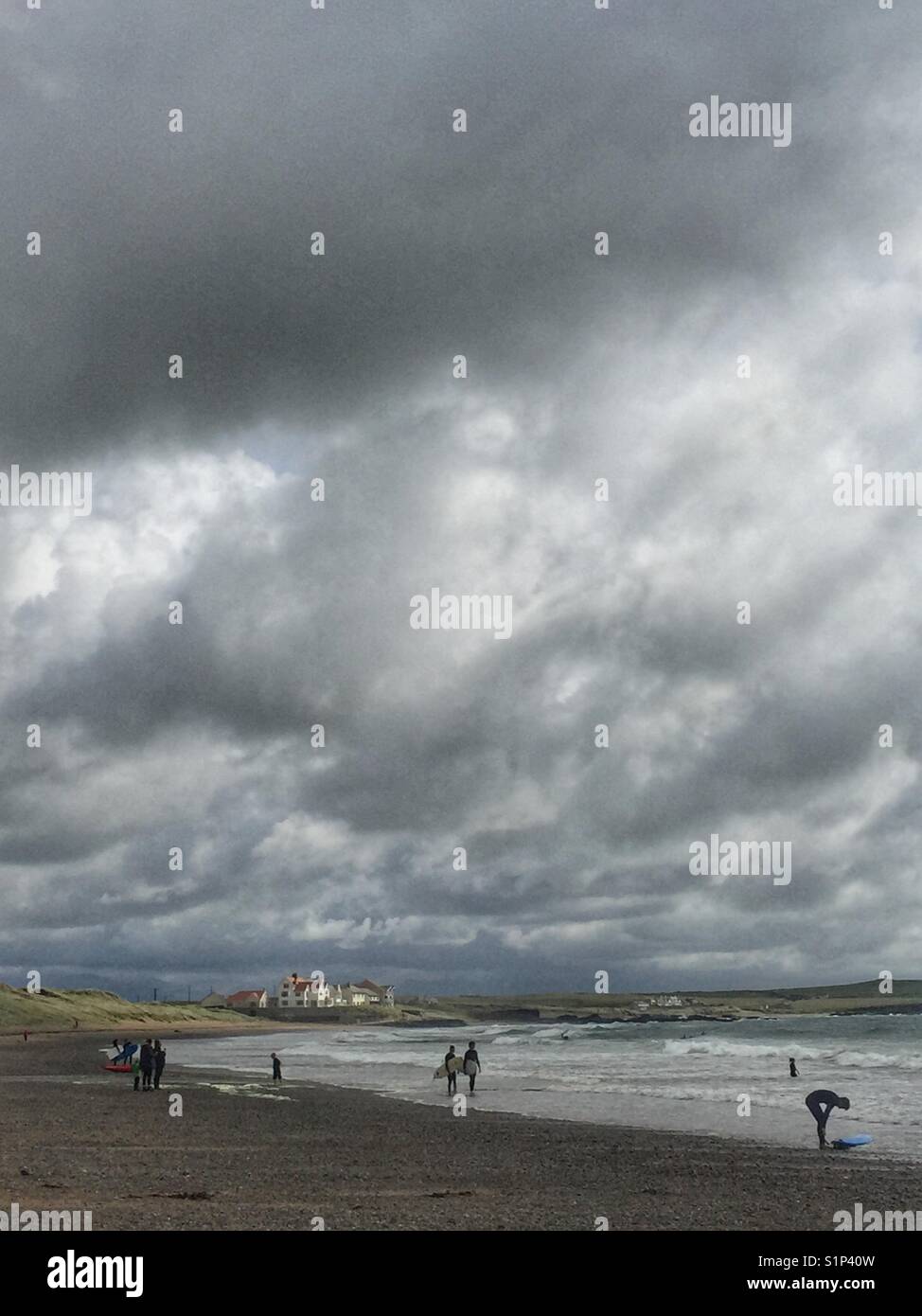 Watersports in action on Broad Beach, Rhosneigr, Anglesey, North Wales - Smartphone Captured Stock Image