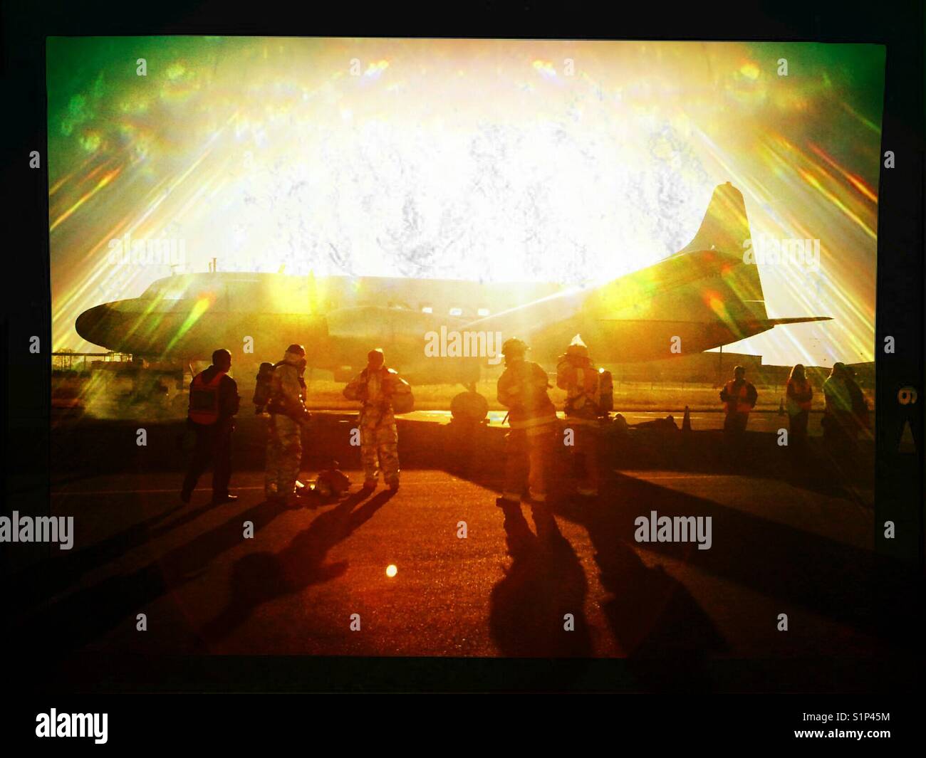 Hazmat and soldiers at aircraft emergency drill - Smartphone Captured Stock Image