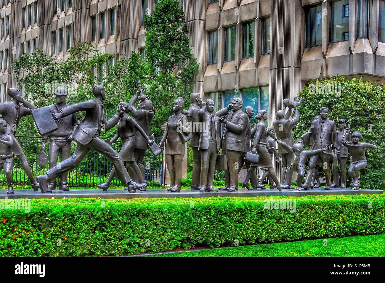 Community (2001) 21 bronze life size sculpture figures by Kirk Newman, Bloor St East, Toronto, Canada - Smartphone Captured Stock Image