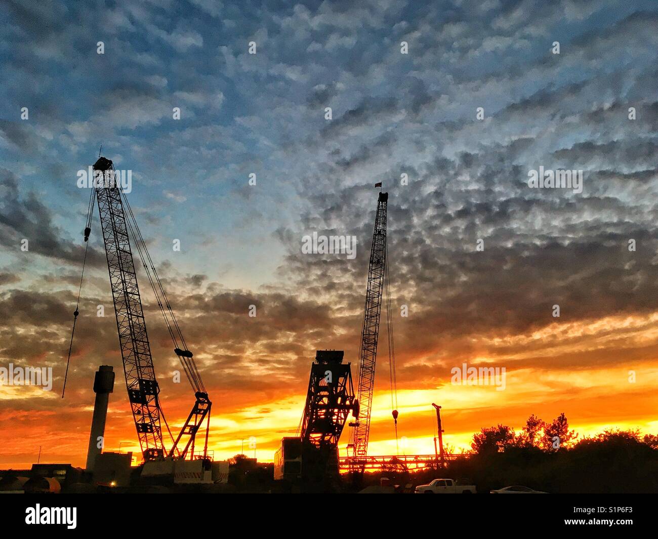 Sunset over construction site in Moline, Illinois, USA Stock Photo