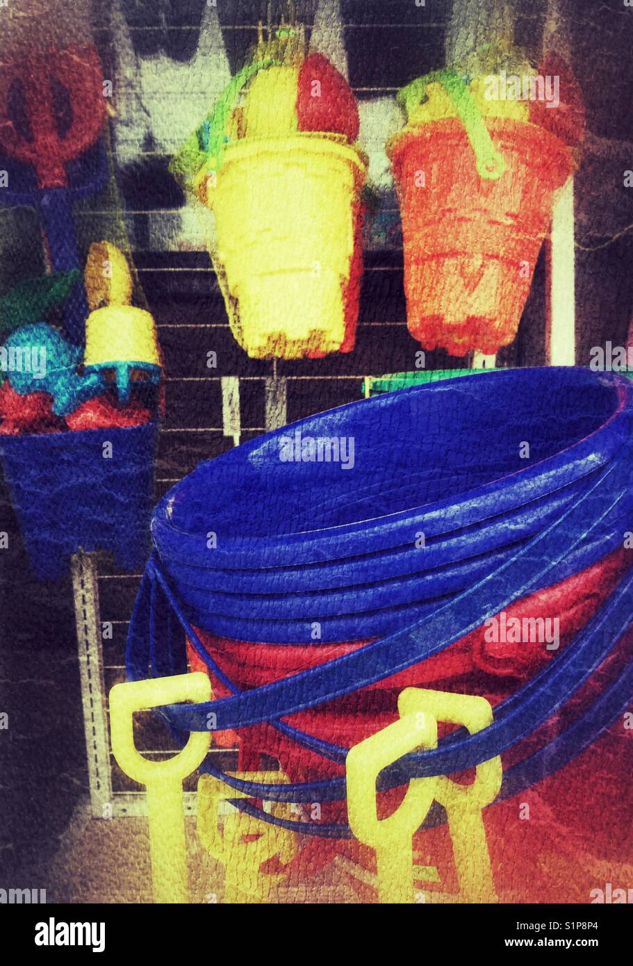 Colourful sand buckets. Stock Photo