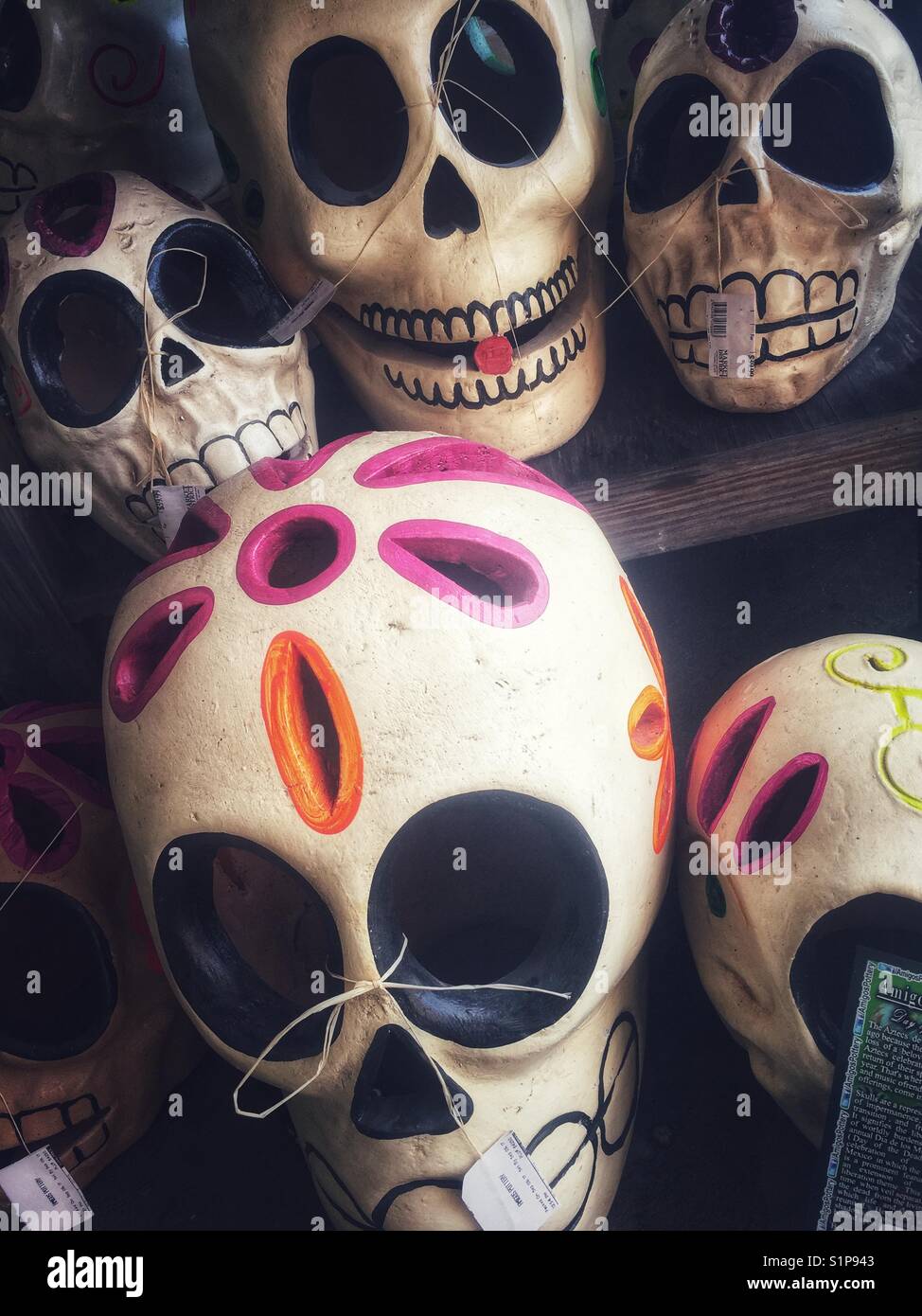 Pottery skulls with large eyes and painted colorfully Stock Photo