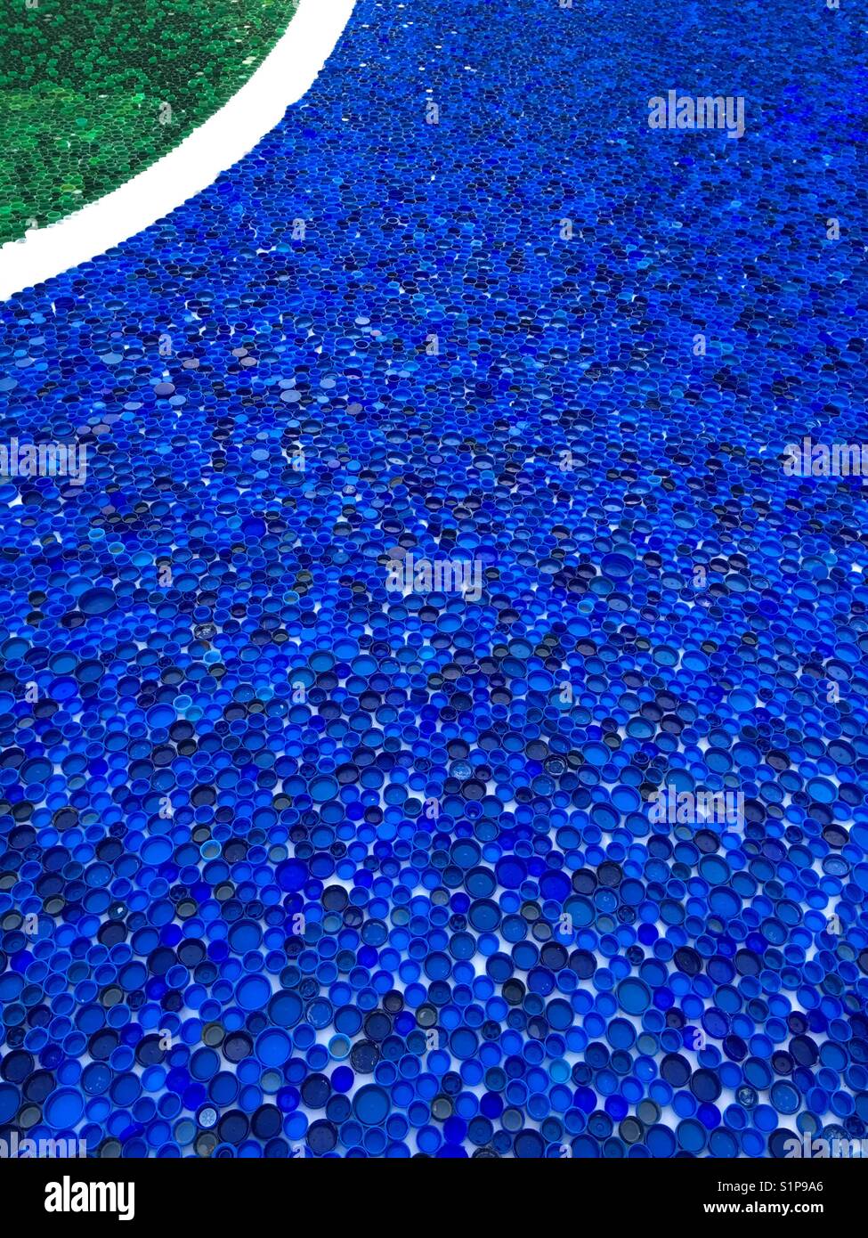 Detail of a mosaic created from bottle tops for Guinness book of records, in Novi Sad in Serbia - Smartphone Captured Stock Image