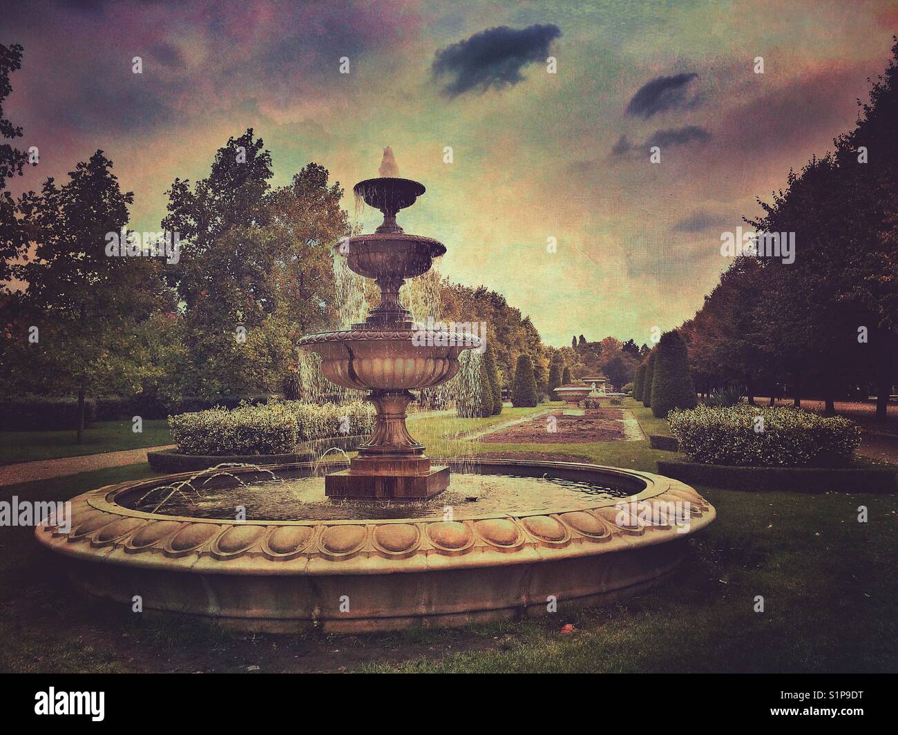 A decorative fountain in the Avenue Gardens in The Regent's Park in London, UK - Smartphone Captured Stock Image