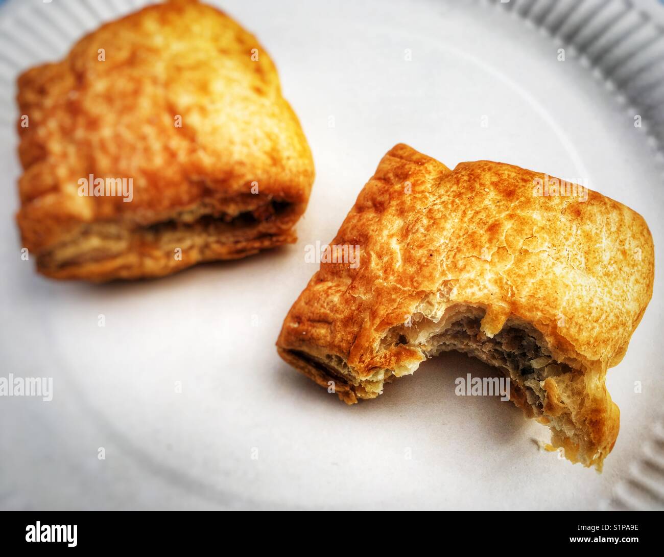 CoOp irresistible all butter pastry sausage rolls Stock Photo Alamy