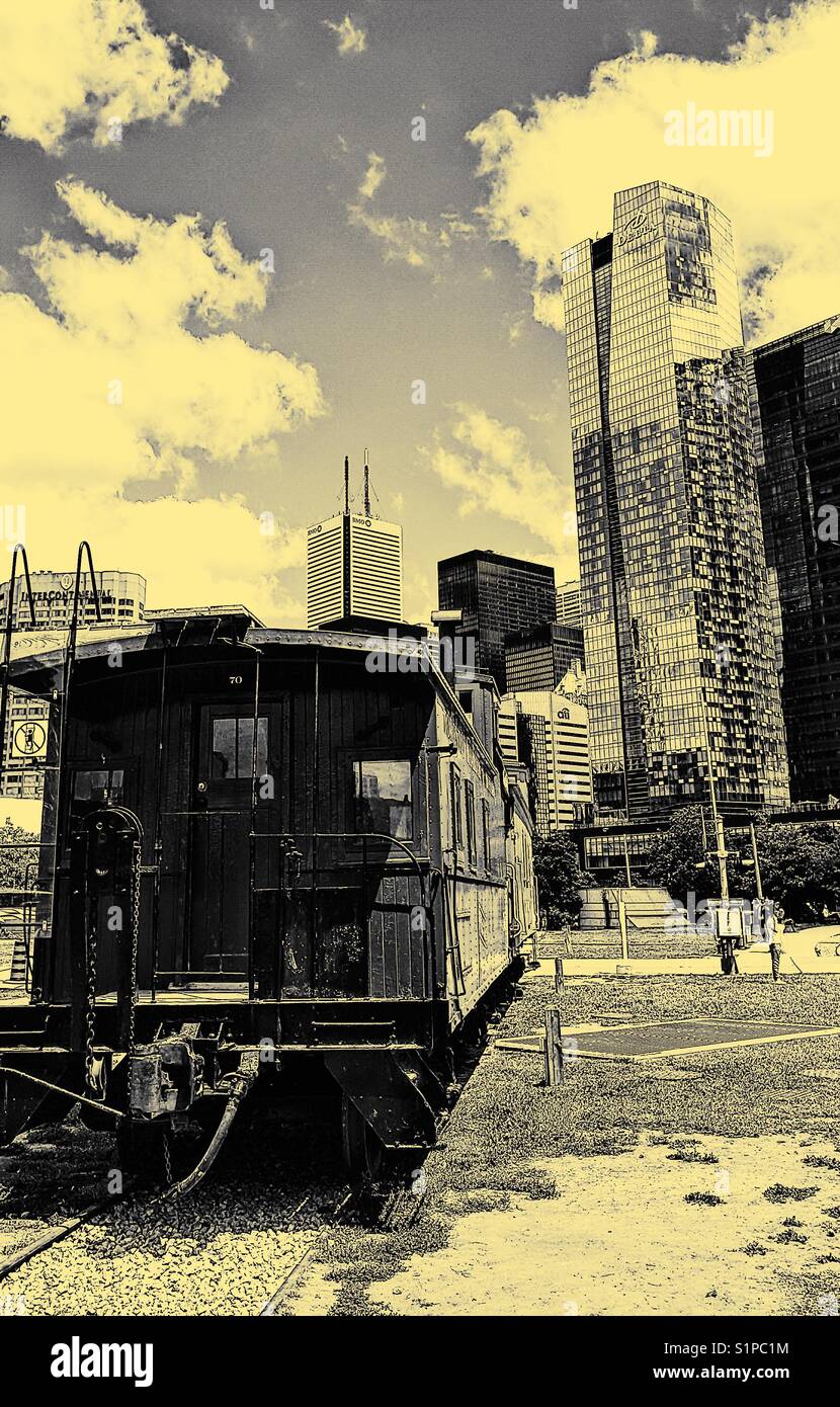 Old train at Toronto Railway Museum and skyscrapers, Ontario, Canada - Smartphone Captured Stock Image