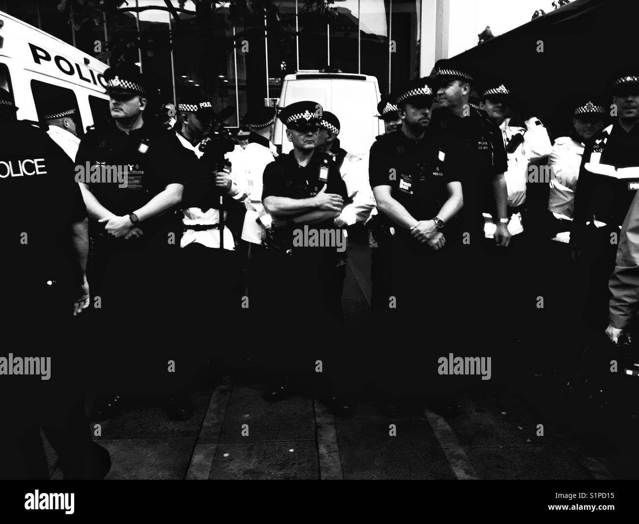 Police officers at a demonstration in the UK - Smartphone Captured Stock Image