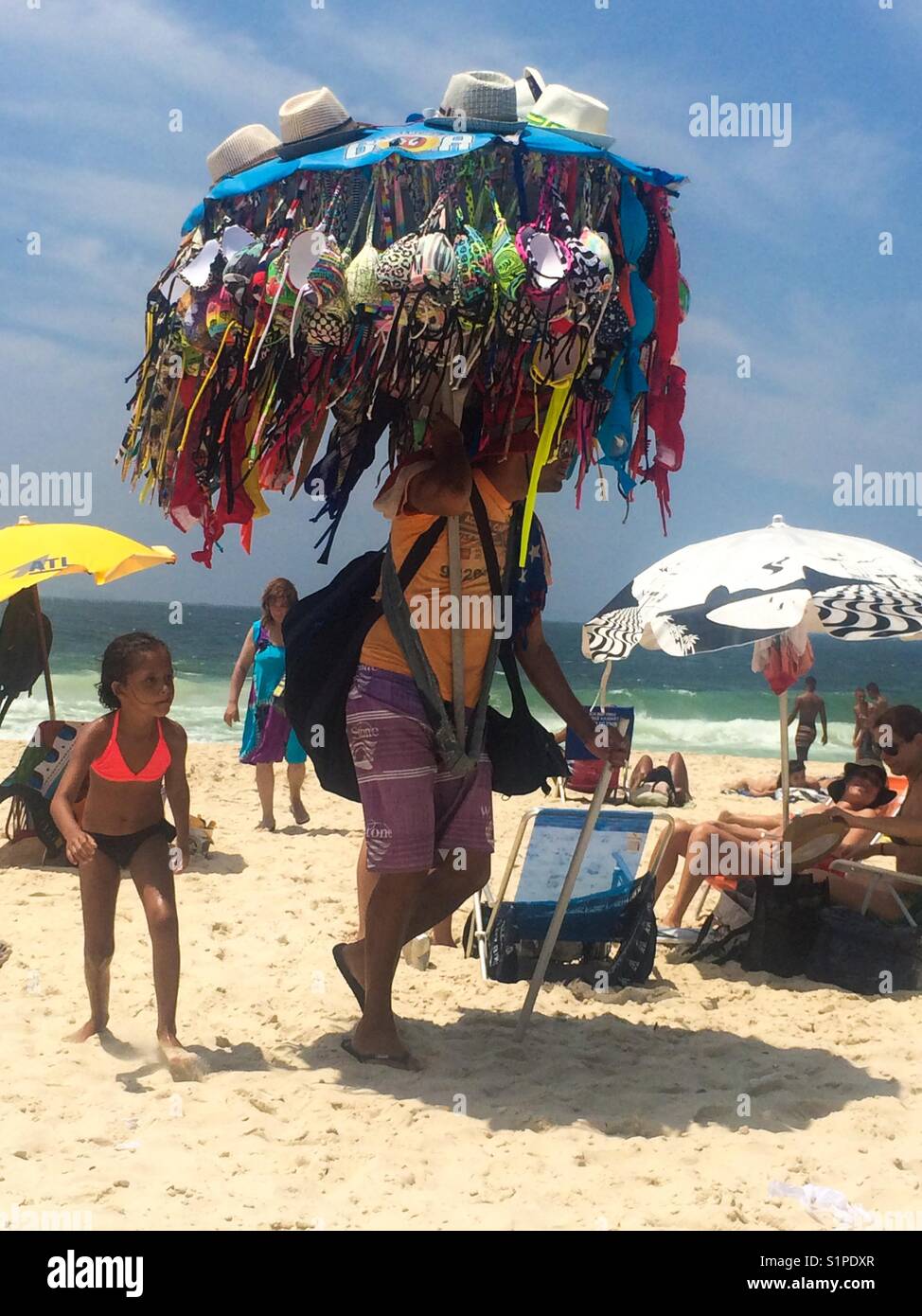 Beach bikini vendor in Rio de Janeiro, Brazil Stock Photo - Alamy