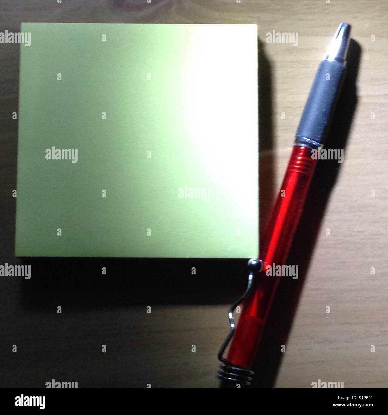 Note pad for your text - with a red pen Stock Photo