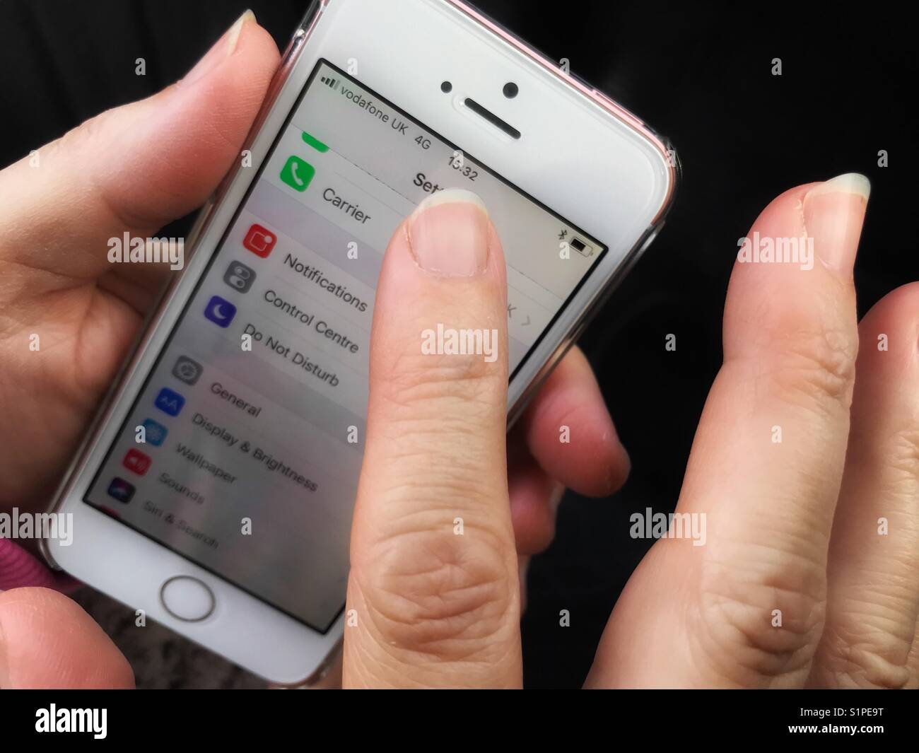 POV the settings screen of an iPhone - Smartphone Captured Stock Image