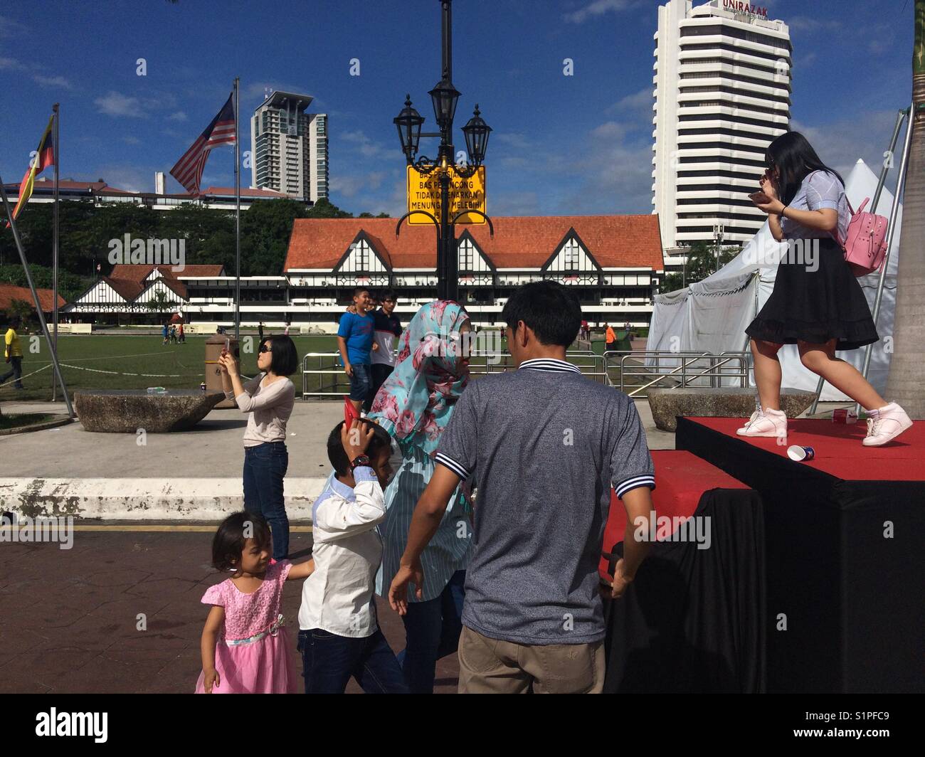People visiting Dataran Merdeka, Kuala Lumpur Stock Photo