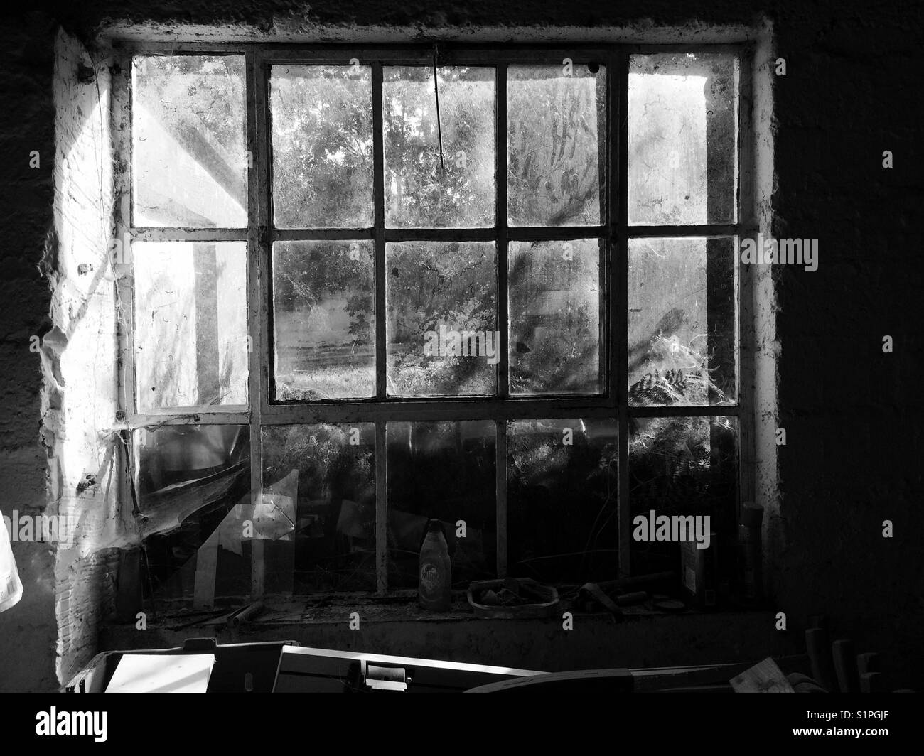 Old workshop window - Smartphone Captured Stock Image