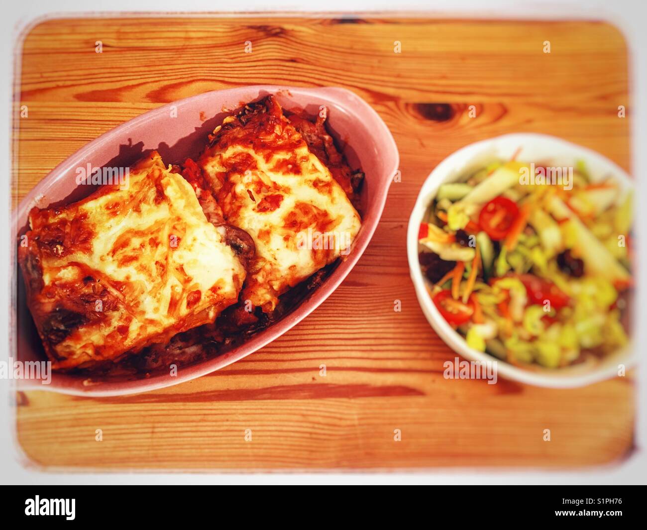Homemade beef lasagne with salad - Smartphone Captured Stock Image