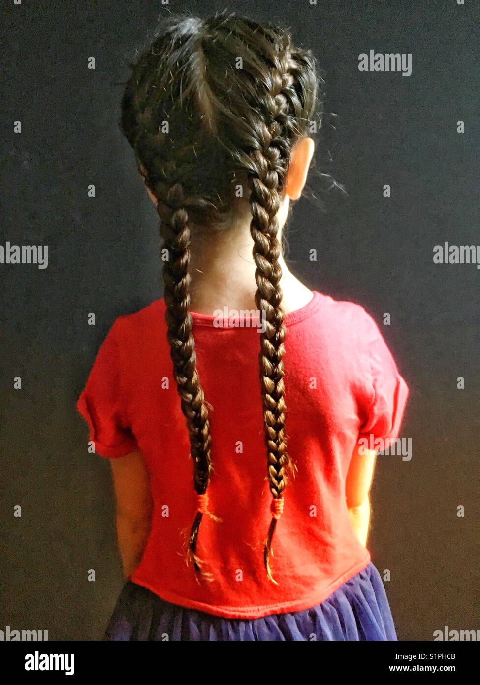 Girl with pigtails Stock Photo - Alamy