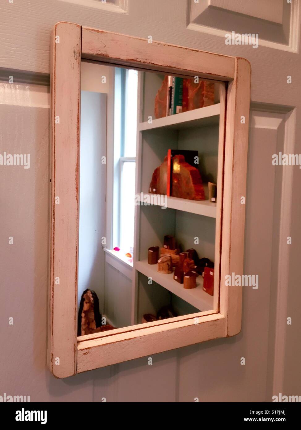 Mirror in a souvenir shop, South Carolina, USA - Smartphone Captured Stock Image