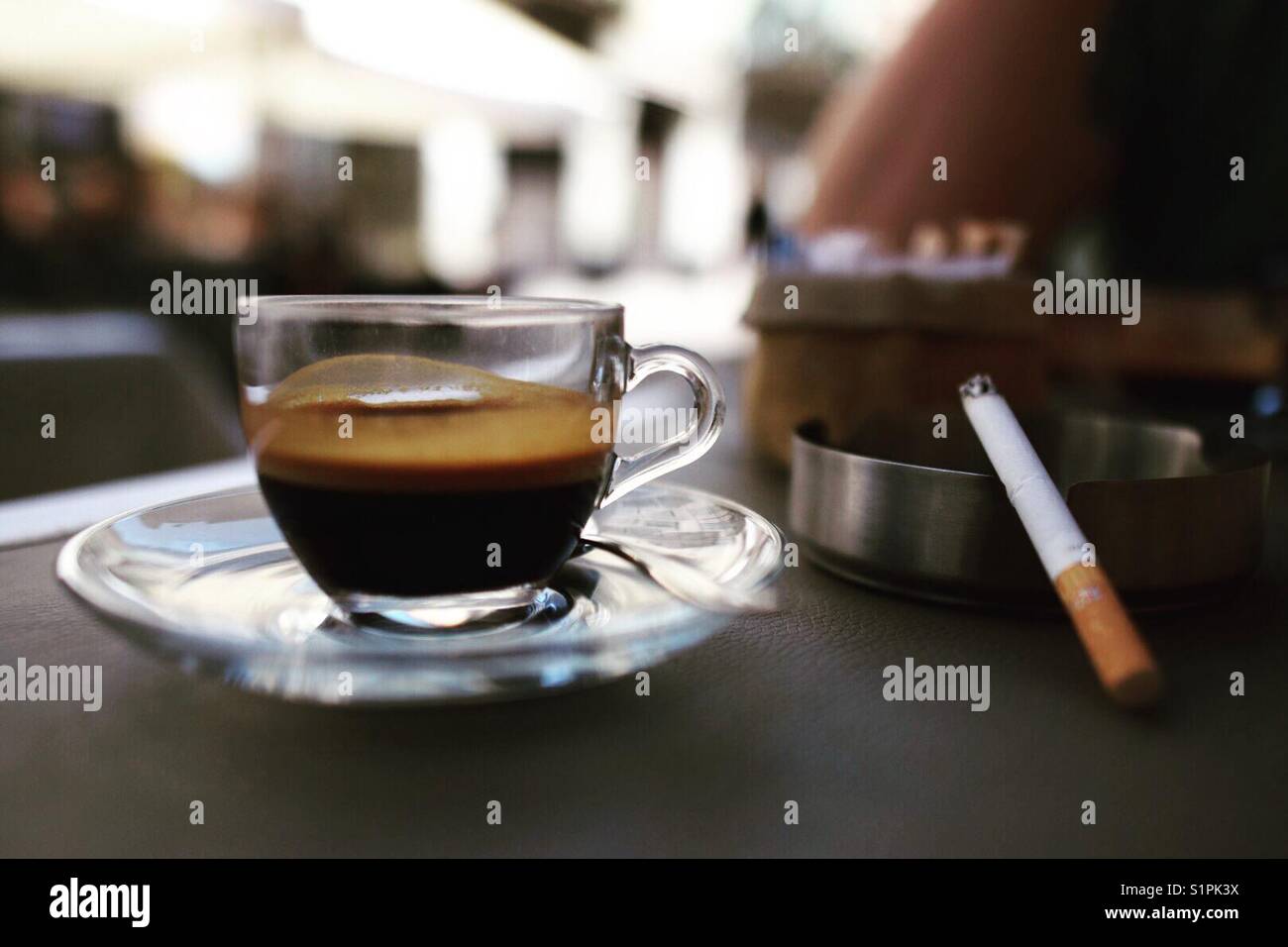 Coffee and cigarette hires stock photography and images Alamy