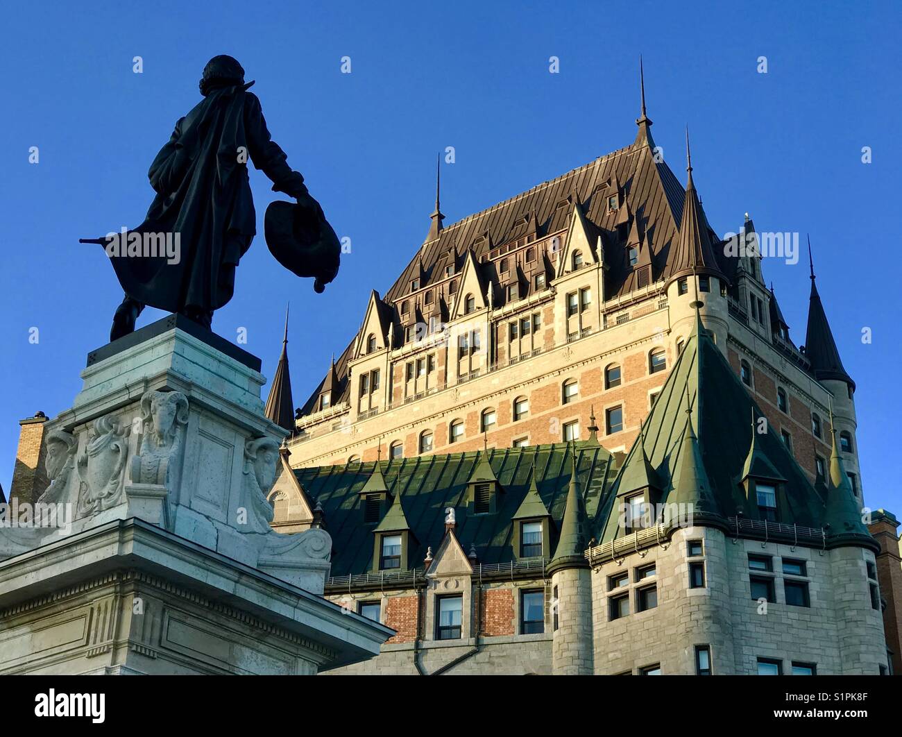 Dawn on Chateau Frontenac and statue of Champlain, Quebec City, Canada Stock Photo