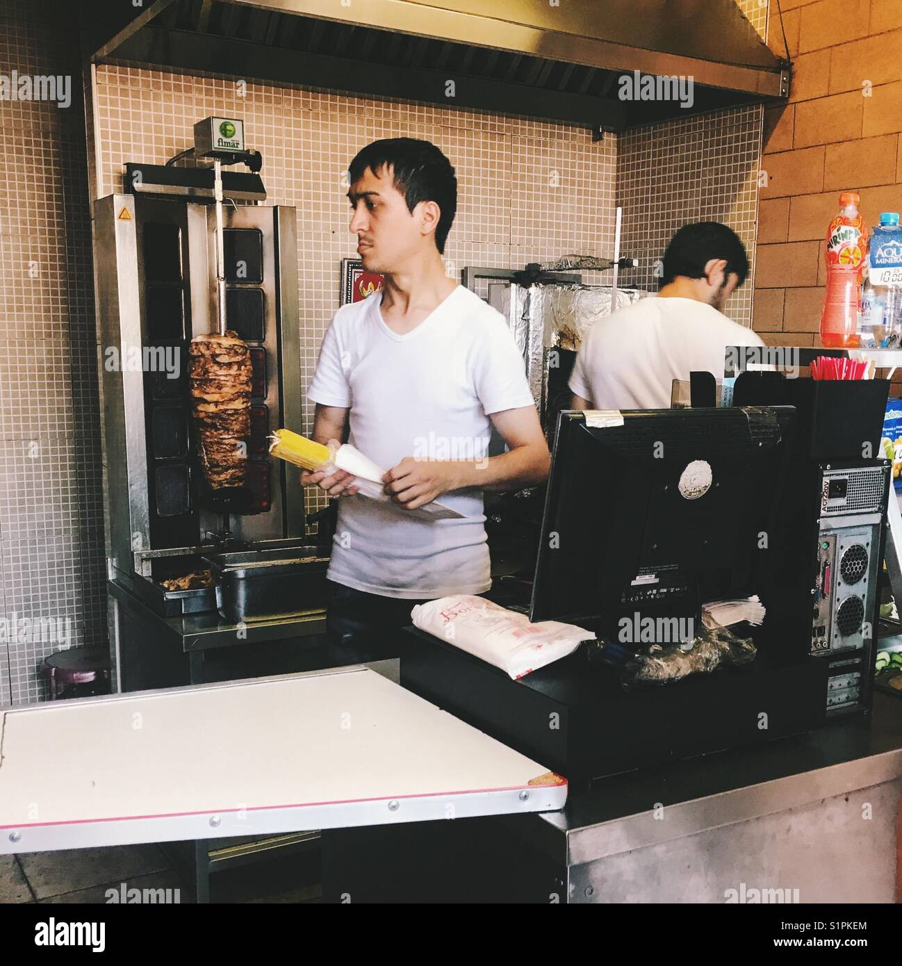 The kebab seller at the Bessarabsky Market tending their business - Smartphone Captured Stock Image