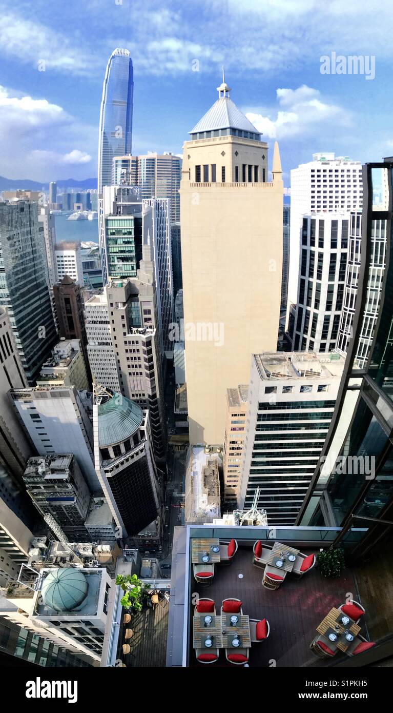 A photo taken from a skyscraper in Hong Kong onto other skyscrapers in Hong Kong. Stock Photo