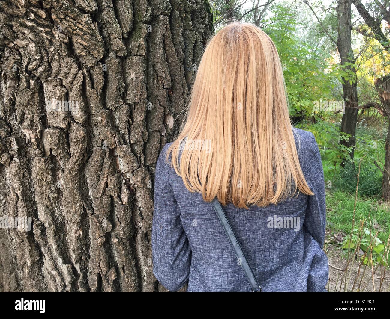 Standing by an old tree - Smartphone Captured Stock Image