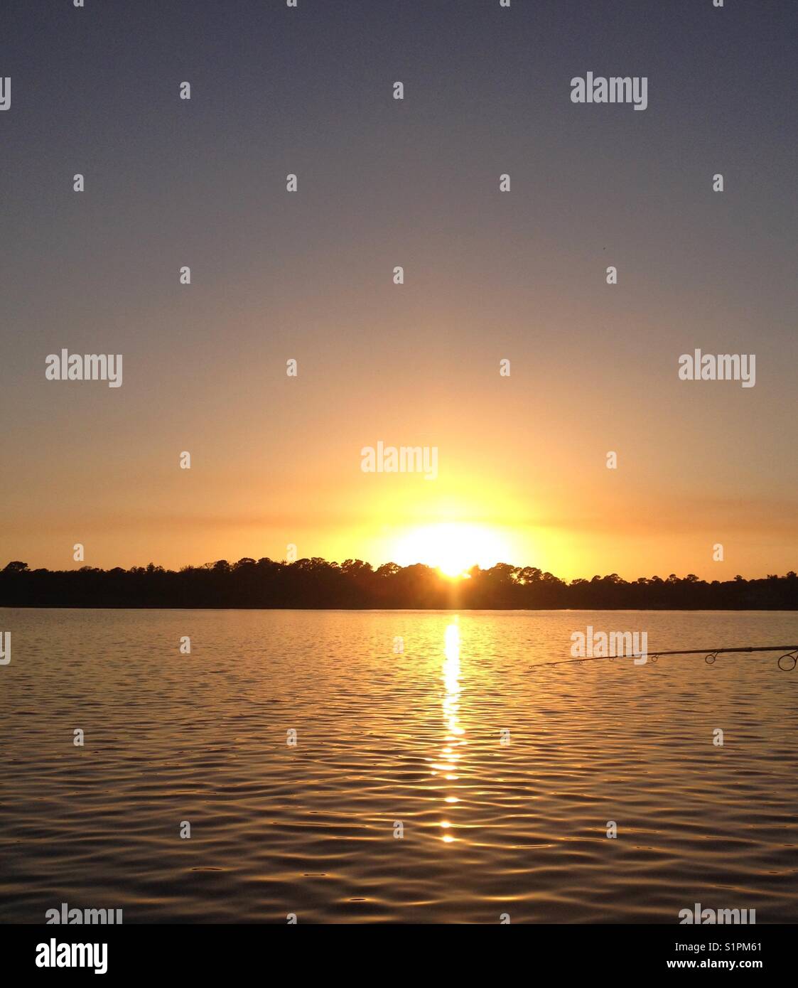 Sunset fishing in Lake Placid, Florida Stock Photo Alamy