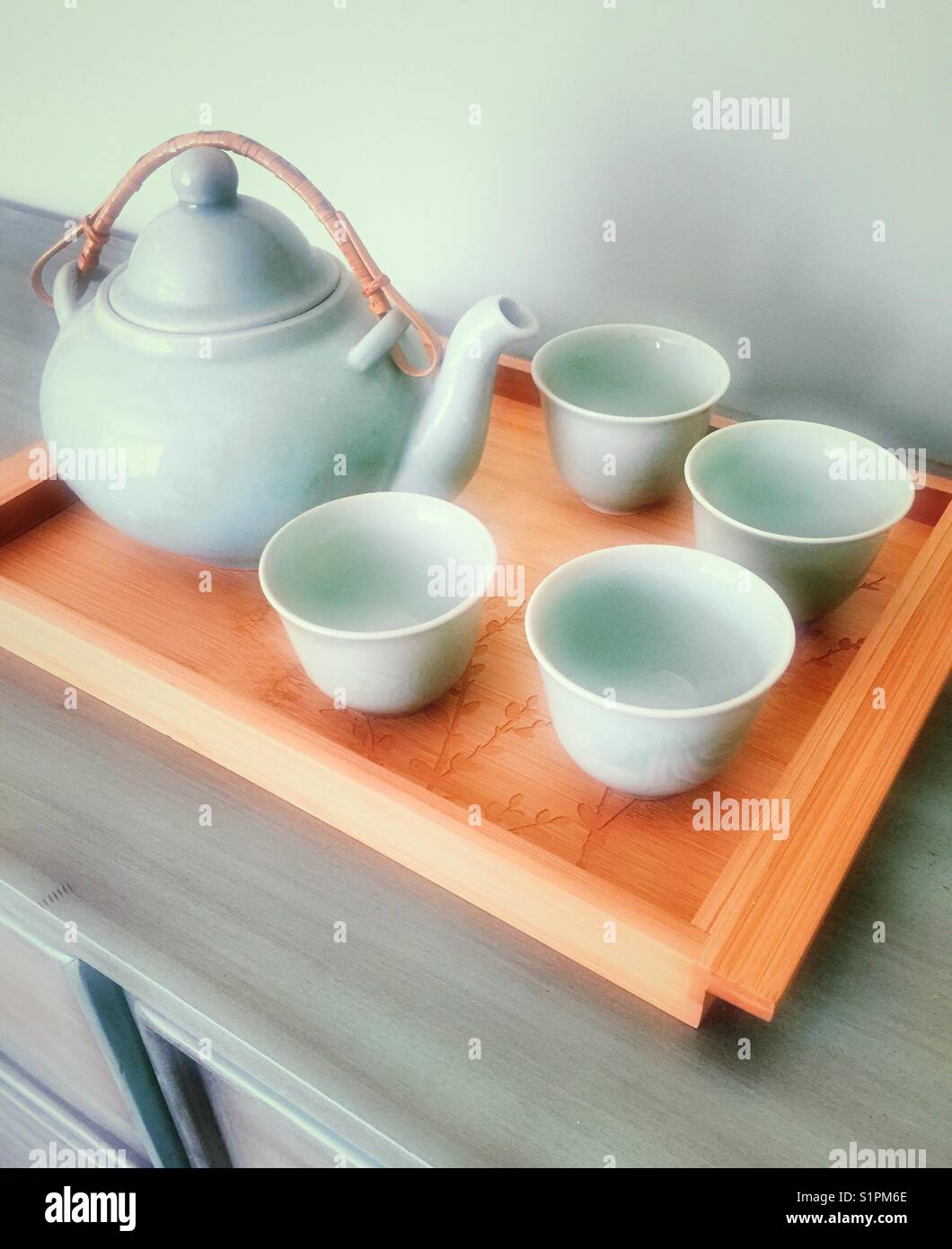 Teapot and cups of an Asian tea service Stock Photo Alamy