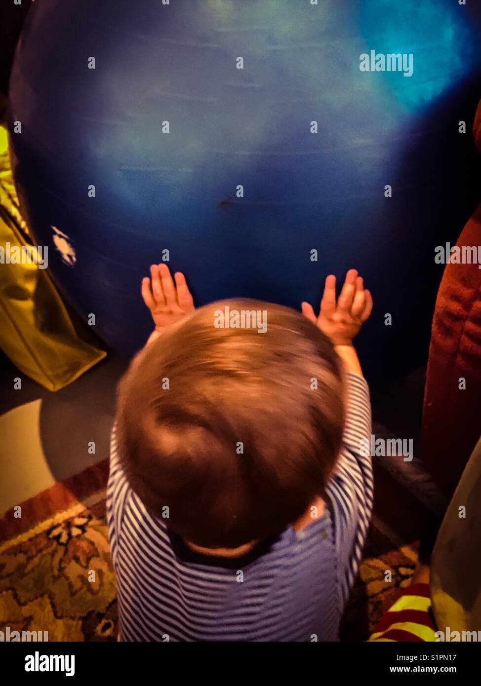 Baby hands big ball - Smartphone Captured Stock Image