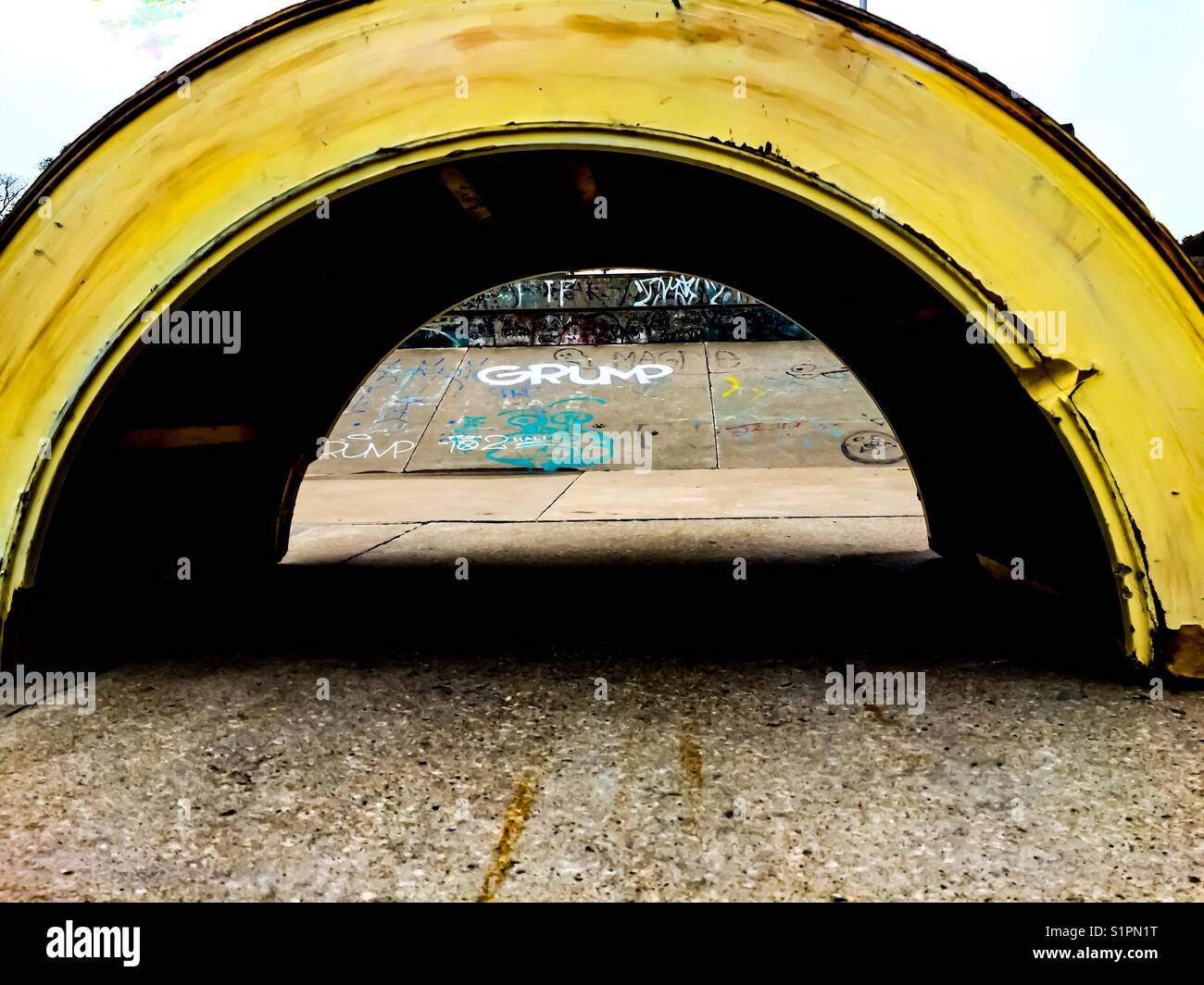 Trump or Grump through an archway - Smartphone Captured Stock Image