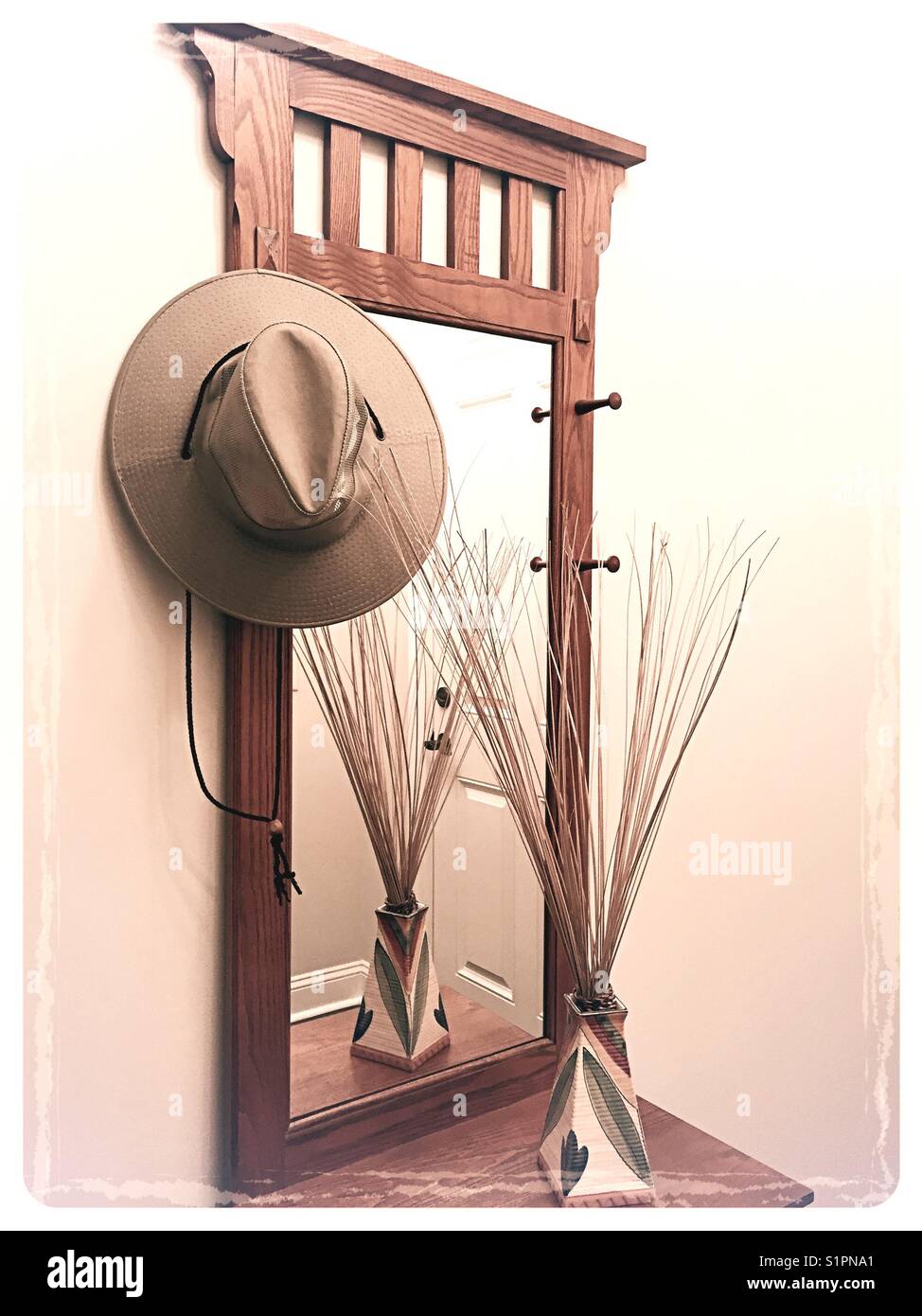 Entry hall mirror with hat rack, USA - Smartphone Captured Stock Image