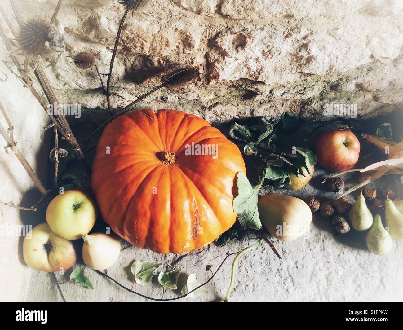Harvest Festival, pumpkin and fruit in a church porch Stock Photo