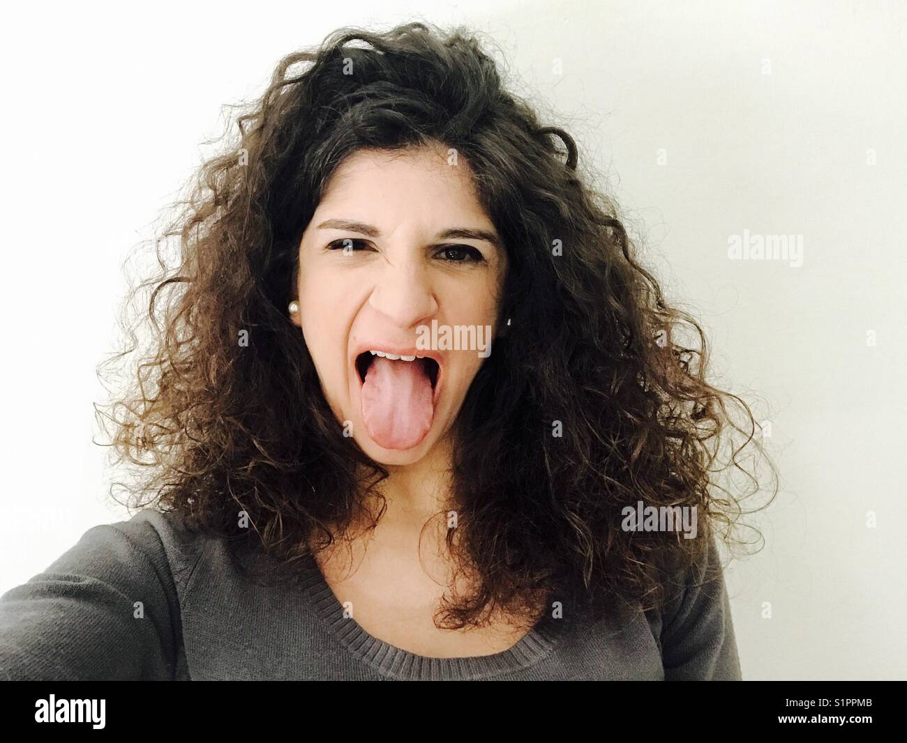Girl tongue Stock Photo