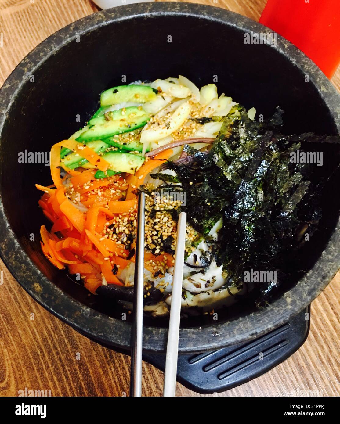 A bowl of Korean Bibimbap, a traditional Korean dish. Stock Photo