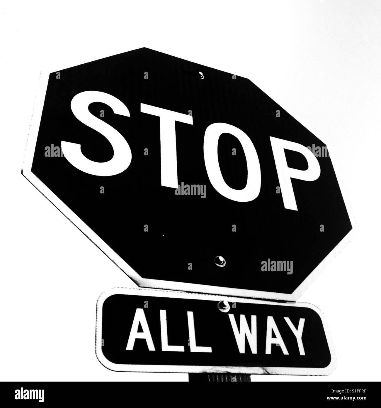 Stop all way silhouetted on b&w - Smartphone Captured Stock Image