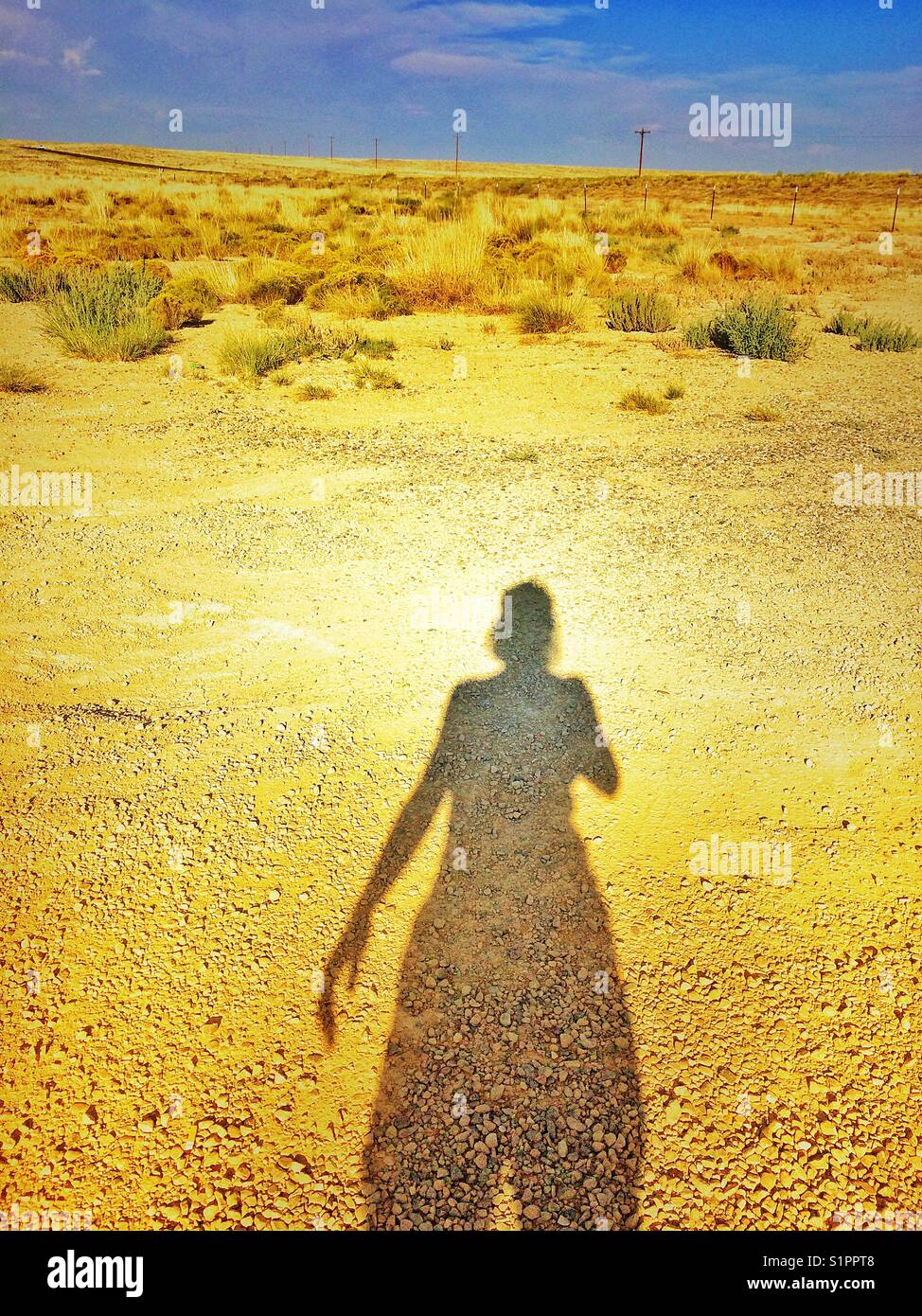 Self portrait shadowy at desert, Arizona, USA Stock Photo