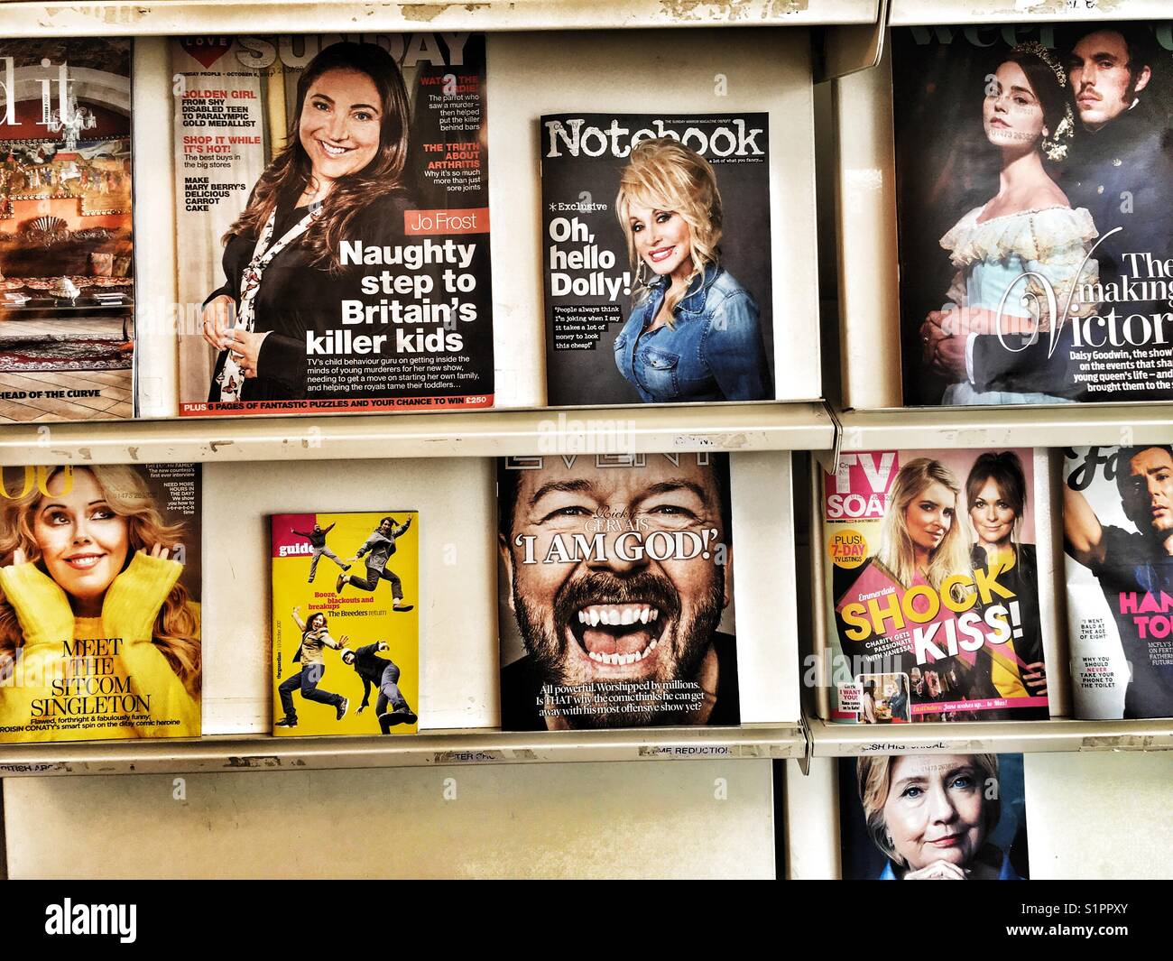 Selection of Sunday newspaper supplements available to read in a library, Ipswich, Suffolk, UK. - Smartphone Captured Stock Image