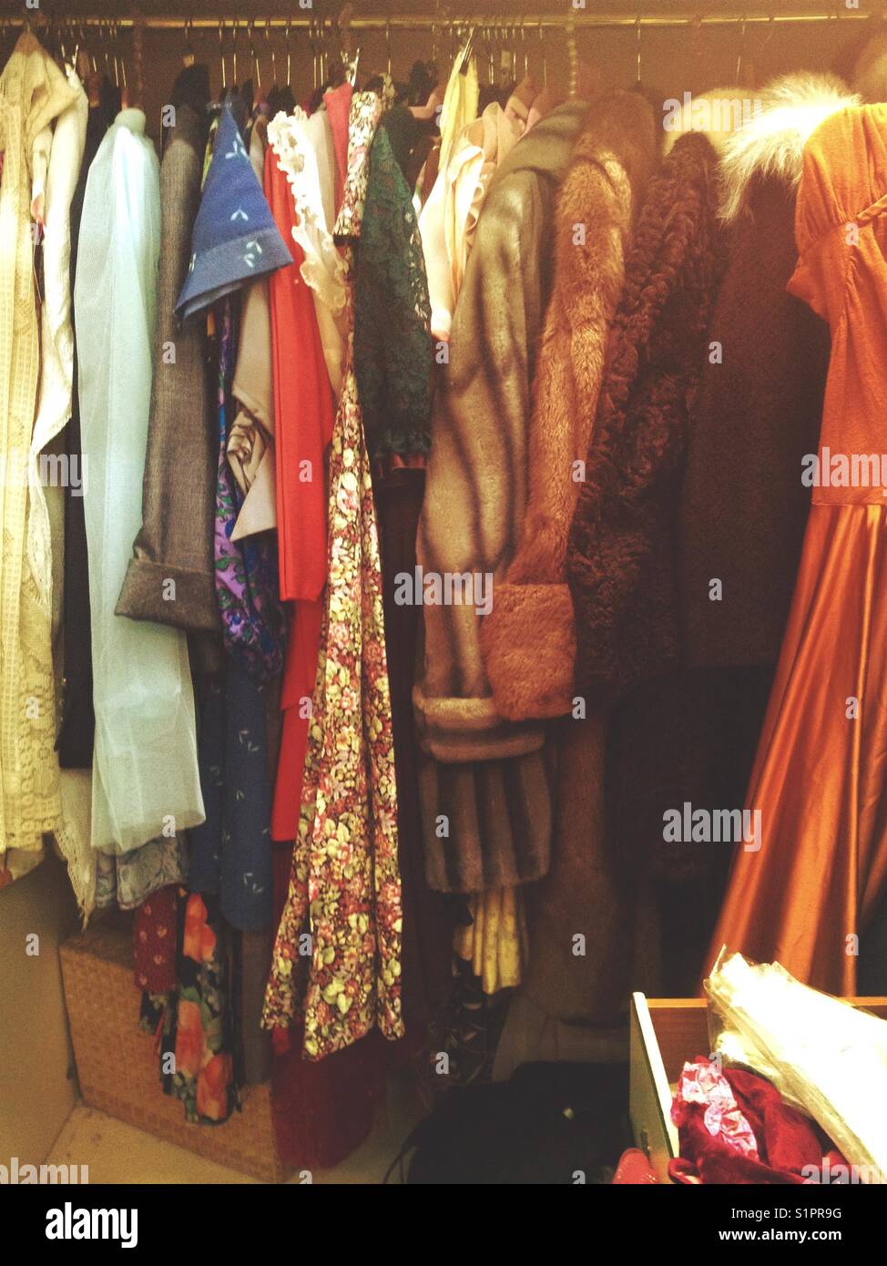 Cupboard full of vintage clothes - Smartphone Captured Stock Image