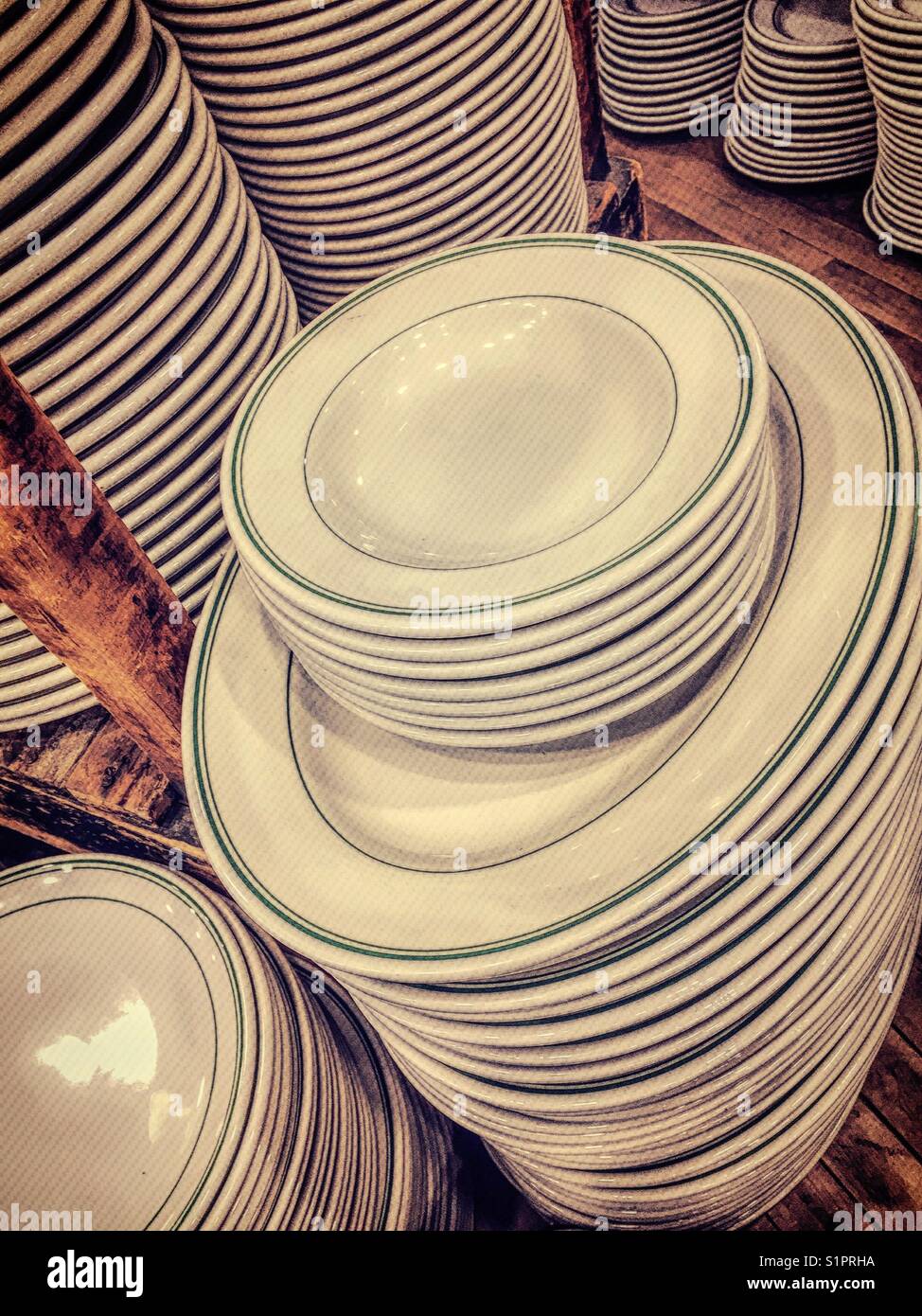 Ceramic plates stacked on display in Fish’s Eddy,NYC,USA - Smartphone Captured Stock Image