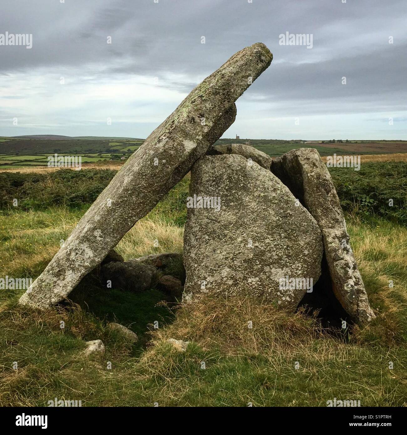 Mulfra Quoit, a Neolithic dolmen in the county of Cornwall in England. It stands on Mulfra Hill to the north of the hamlet of Mulfra. Stock Photo