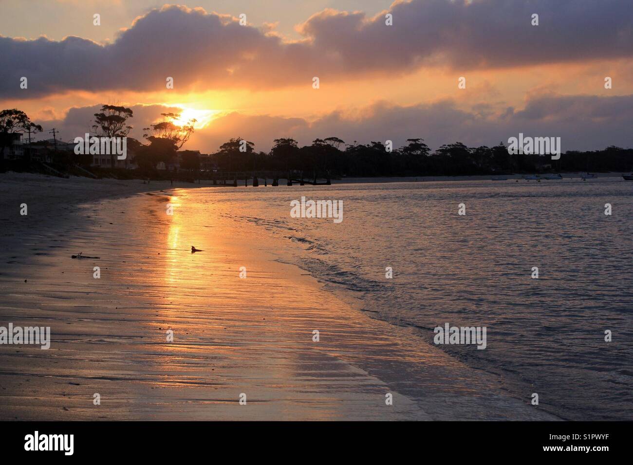 Sunset and reflection over beach - Smartphone Captured Stock Image