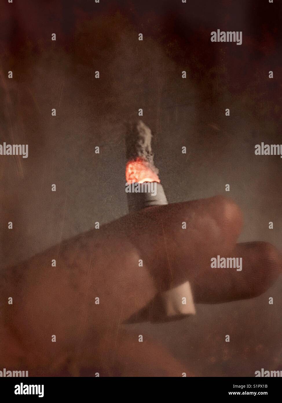 Burning cigarette from smoker's point of view Stock Photo Alamy