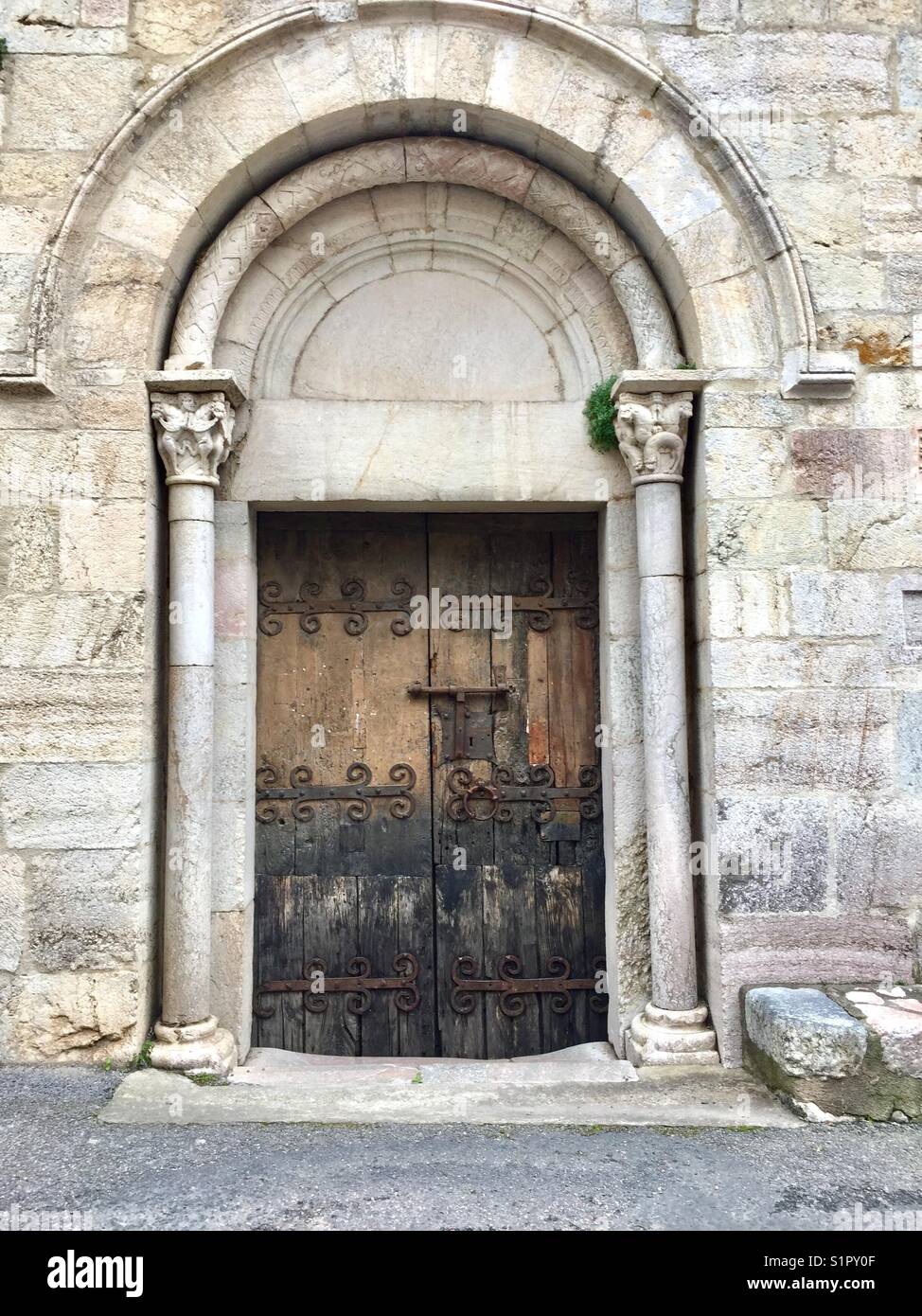 Church doorway of St.Jacques in Villefranche-de-Conflent, Pyrénées-Orientales, Languedoc-Roussillon, France Stock Photo