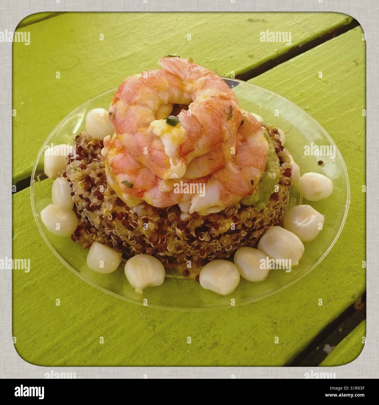 Quinoa avocado salad with shrimp ceviche and Peruvian corn, served at Rockaway beach 98 in Queens, New York - Smartphone Captured Stock Image