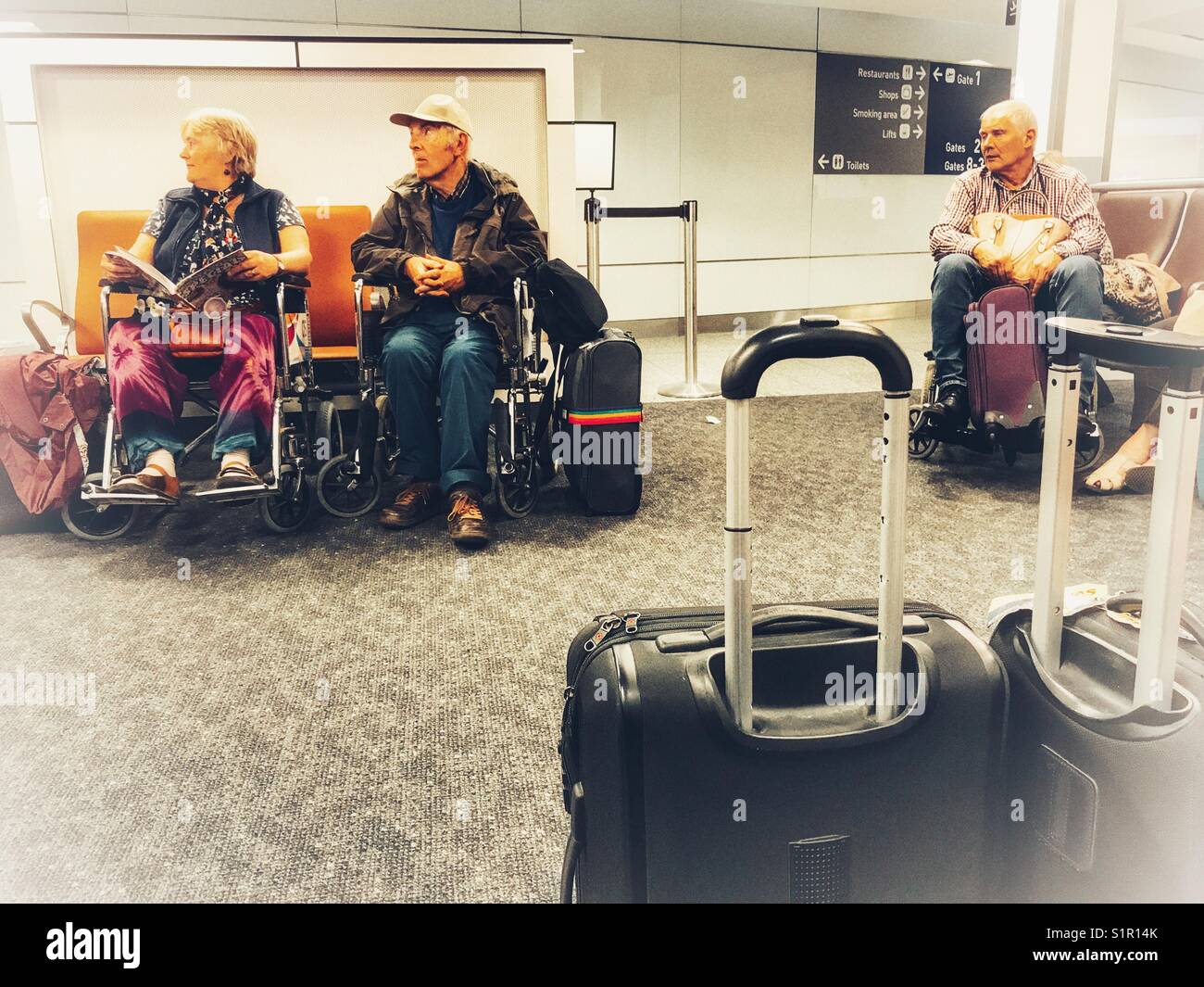 People in wheelchairs in the assisted passengers area of Bristol