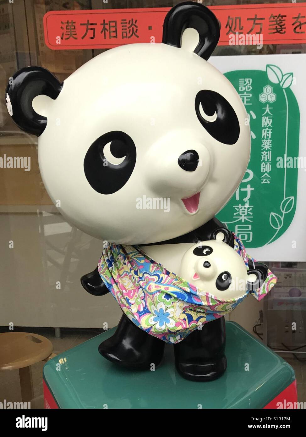 Panda and baby sculpture in Shinmachi, Osaka, Japan. - Smartphone Captured Stock Image