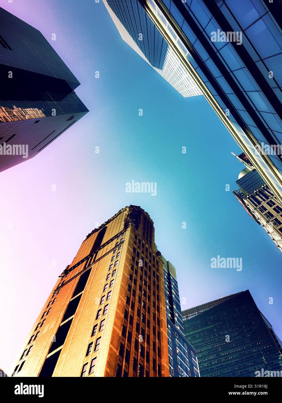 Skyscrapers shot from below with blue sky, NYC, USA - Smartphone Captured Stock Image