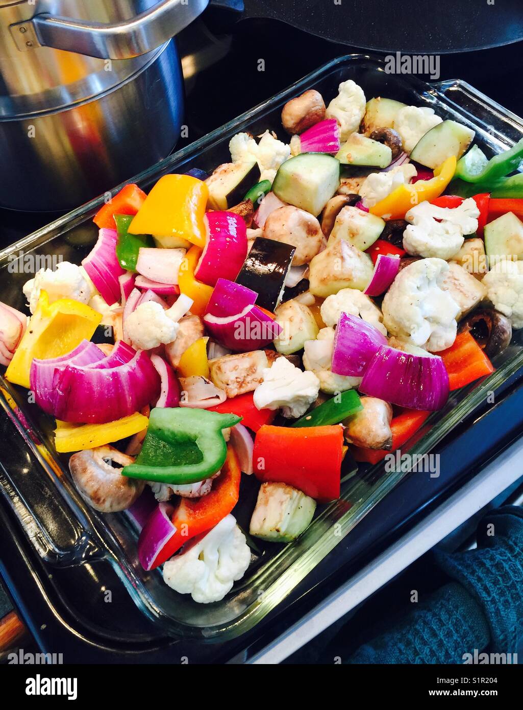 Chopped fresh vegetables in a glass pan - Smartphone Captured Stock Image Chopped fresh vegetables in a glass pan - Smartphone Captured Stock Image