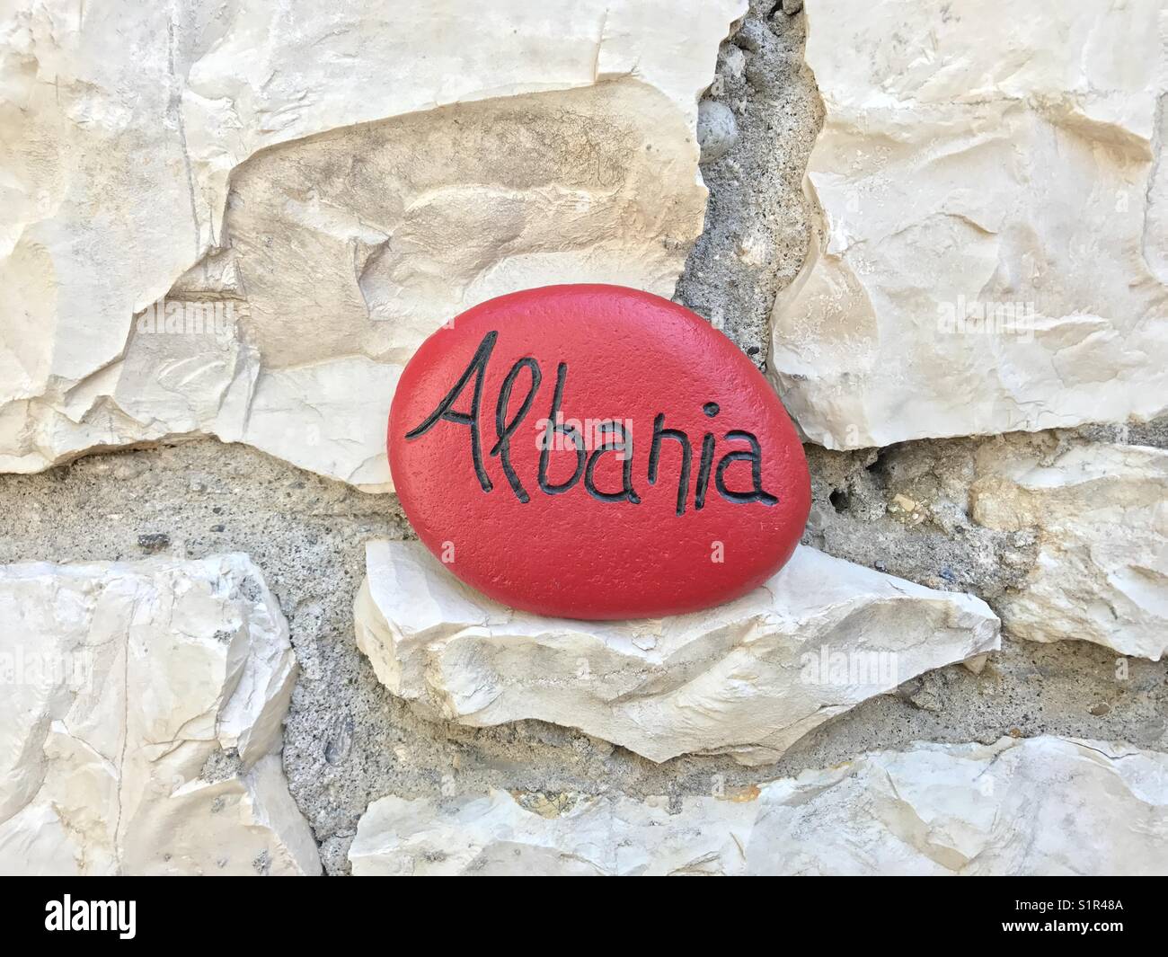 Albania on a Stone over a wall in the Unesco city of Berat - Smartphone Captured Stock Image